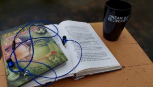 Image of a cloudy day with a hot coffee with soft music to create of a reading enviroment
